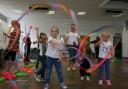 Children taking part in circus skills event