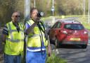Volunteers Dave Blackiston and Charlie Bartlett watch the roads