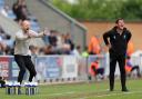 Colchester United manager Ben Garner gestures on the touchline. Image: PA