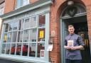 'Little Pub Books'- Samuel Pepys Chef Tommy holding a Little Pub Book
