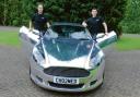 Petrol-heads – Perry Cox and Tony Harris with their chrome Aston Martin DB9