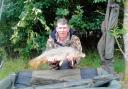 SPECIAL CATCH: Richard Harfield with his first common carp – a 12lbs 2ozs catch from Bradfield Lake.