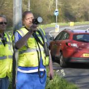 Volunteers Dave Blackiston and Charlie Bartlett watch the roads