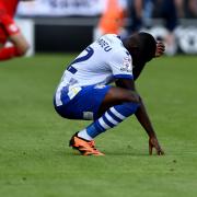 Colchester players were left dejected after their late loss to MK Dons