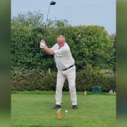 Time for tee: John Hayes drives in as new club captain of Harwich and Dovercourt Golf Club.