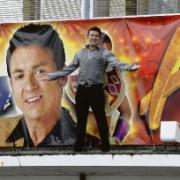 Billboard star – Shane Richie climbs up on the front of the Cliffs Pavilion, Westcliff,  where he will appear in December