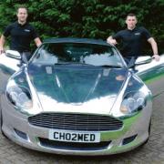 Petrol-heads – Perry Cox and Tony Harris with their chrome Aston Martin DB9