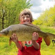 TOP CATCH: Rosie Mortimer managed to catch this 10lbs 2ozs common carp from Bradfield Lake.