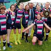 PARTY TIME: Harwich and Dovercourt Owls celebrate their eye-catching success at the sevens festival in North Walsham.