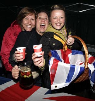 03-06-12
Jubilee celebrations with fireworks at Dedham.
Pims stall ladies (from left) Michela Duffin, Lucy Messum and Shelly Wilson.