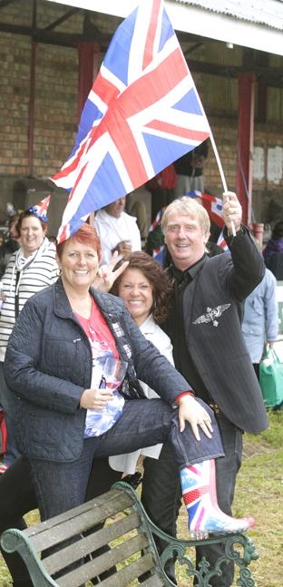 03-06-12
Jubilee at Harwich Royal Oak football club.
Mel Farrow shows off her wellies with Tracey and Rob Hales.