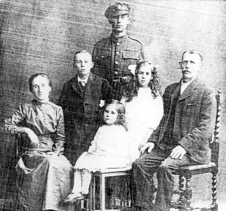 POIGNANT PHOTO: This family picture is
thought to have been taken about a week before
Morris Fordham, of Mistley, was killed in action on
September 8, 1918, aged 18.