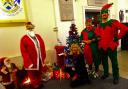 Volunteering - Princes Theatre staff take on Santa and elf duties. Photo: Princes Theatre