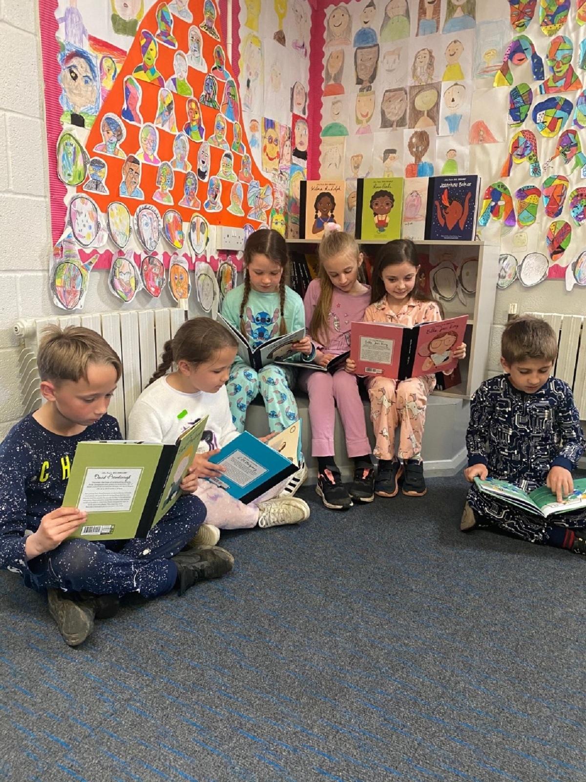 Reading frenzy - Ben Rowbotham, Lucy Rowbotham, Lola Brockman, Ruby Mann, Eden Carter and Zachary Bayley, reading books from the Little People, Big Ideas series. The school has just bought these book to inspire students