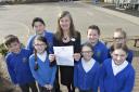 Outstanding - Headteacher Hilary Cook with students at the Ofsted-praised Highfields Primary School