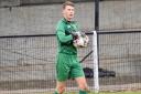 Shoot-out drama: Harwich and Parkeston goalkeeper Brad Cook had little chance with any of Long Melford's penalties in the shoot-out.