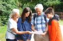 Trail - visitors study the map of the Mistley mystery trail