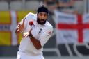 Monty Panesar takes a catch in a Test Match against New Zealand in 2013