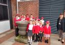 Pupils at Mayflower Primary School with headteacher Liz Bartholemew,