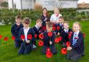 Creative - Pupils from Lawford C of E primary school with the poppies. Picture: City and Country
