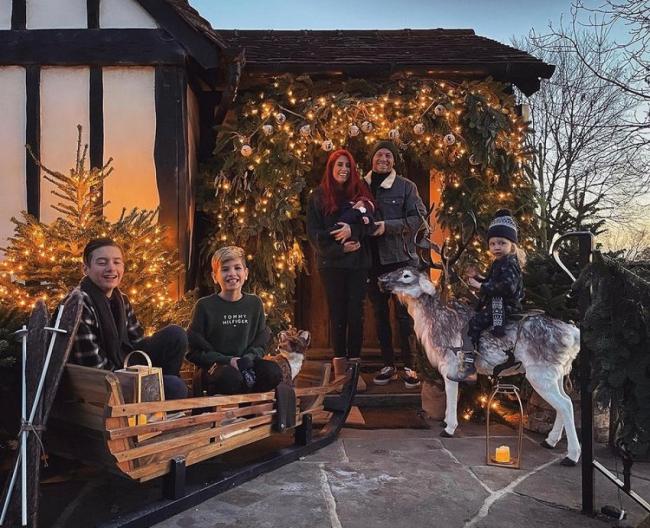 The Loose Woman star, who have birth to daughter Rose earlier this year, posed alongside her partner Joe Swash and sons Leighton, Zach and Rex. Picture: Stacey Solomon/Instagram