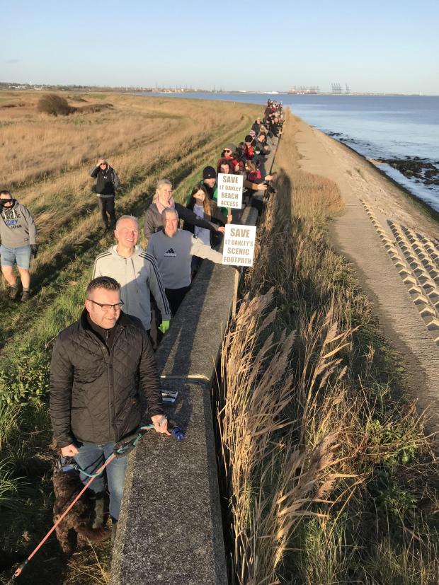 Harwich and Manningtree Standard: Little Oakley residents marched down the Essex Way to Irlams Beach earlier this month.