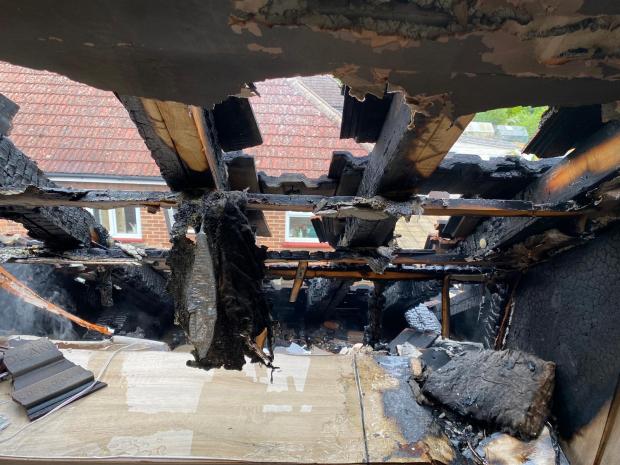 Harwich and Manningtree Standard: The roof of the bungalow was singed in the aftermath