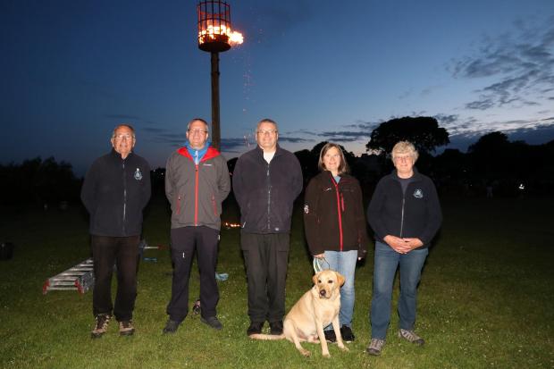 Harwich and Manningtree Standard: Colin Farnell, Geoff Pearson, Alan Baxter, Hugo, Val Baxter and Aileen Farnell - Lighting of the Harwich Jubilee Beacon, Cliff Park Picture: Maria Fowler 2022