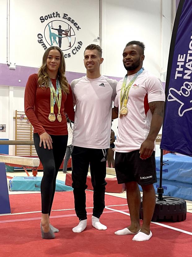 Harwich and Manningtree Standard: Max Whitlock (centre), Georgia-Mae Fenton (left) and Courtney Tulloch at the South Essex Gymnastics Club (PA)