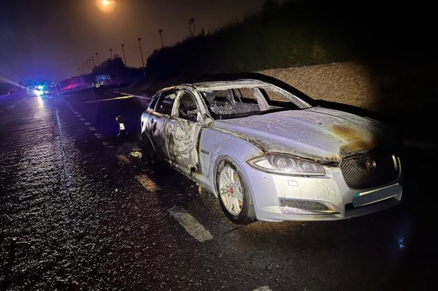 Driver escapes from car 'after smelling smoke' in fire which shut busy road. Photo: EPRoadsPolicing / Twitter