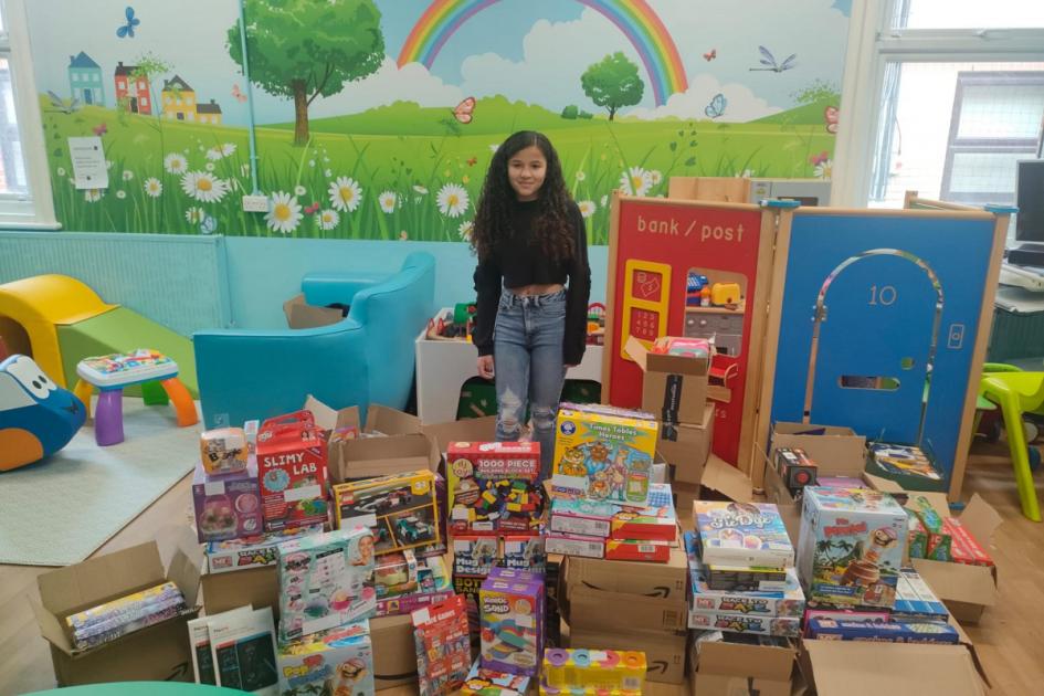 Cancer survivor takes toys to children on hospital ward that cared for her