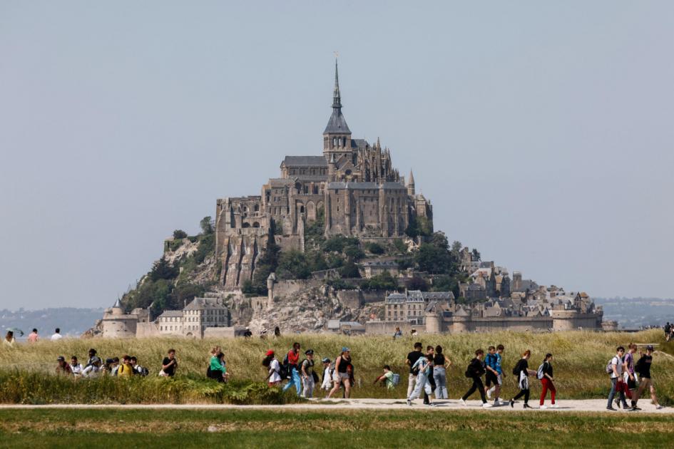 Landmark abbey Mont-Saint-Michel celebrates 1,000th birthday with Macron visit