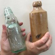 DISCOVERY - The 19th Century lemonade bottle discovered at the site. Picture: Will Lodge/TDC