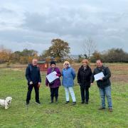 Delighted - Mike and Carol Bush, Little Oakley parish councillors with Dave Attrill, Little Oakley parish council chariman and Little Oakley residents.