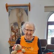 Inspirational - Jean dons her Motor Neurone Disease Association gear and the teddy made by her friend Brenda