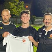 Welcome: new Harwich and Parkeston midfielder Max Gray with manager Sean Tynan (left) and assistant boss, Gary Kioussis.