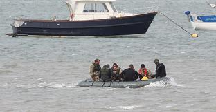 the remains of a ww2 V2 rocket is recovered from Harwich harbour on Saturday
the divers return
