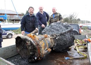 the remains of a ww2 V2 rocket is recovered from Harwich harbour on Saturday
Colin Rose, David Bunn and Gary Good from Harwich and Dovercourt sailing Club with the recovered V2 after it was unloaded on Mistley Quay
