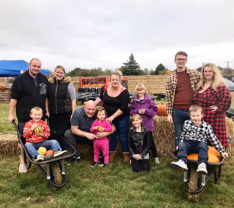 Farm - Family friends at a pumpkin patch 